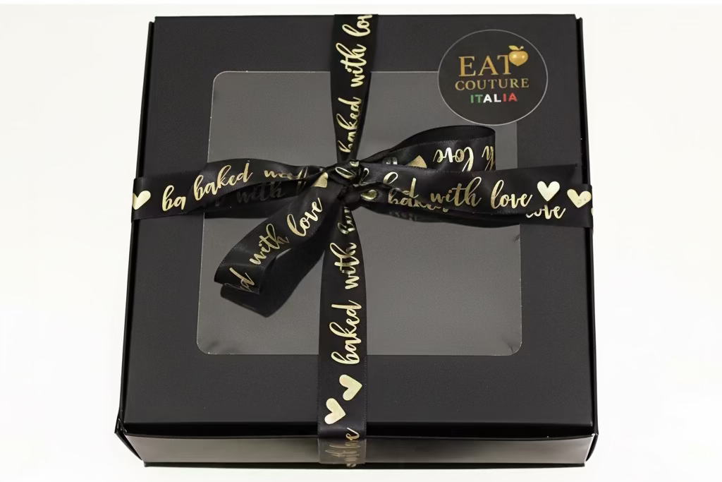 empty box with a decorative ribbon and 'Eat Couture Italia' label.