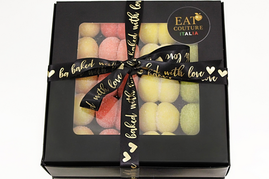 Italian peach cookie gift box with black ribbon and EAT Couture Italia label
