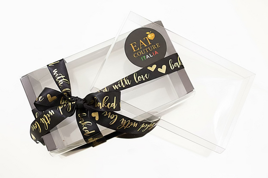 Packaged customized with italian peach cookies with a decorative ribbon and 'Eat Couture Italia' branding.